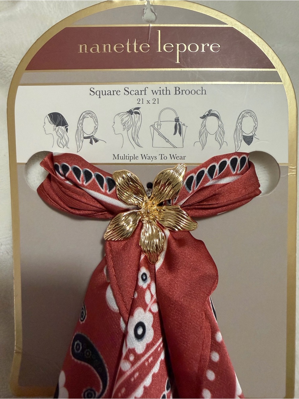Nanette Lepore rust red paisley square scarf with gold floral brooch